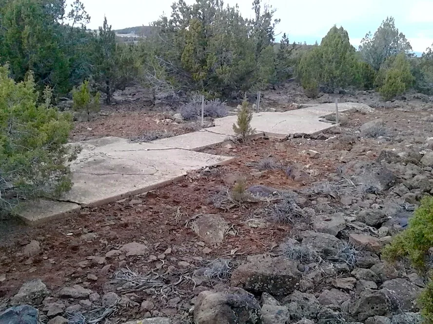This cement navigation arrow on Black Ridge helped guide airmail pilots across Utah in the early days of U.S. aviation. The photo was taken in 2015, facing north-northwest.