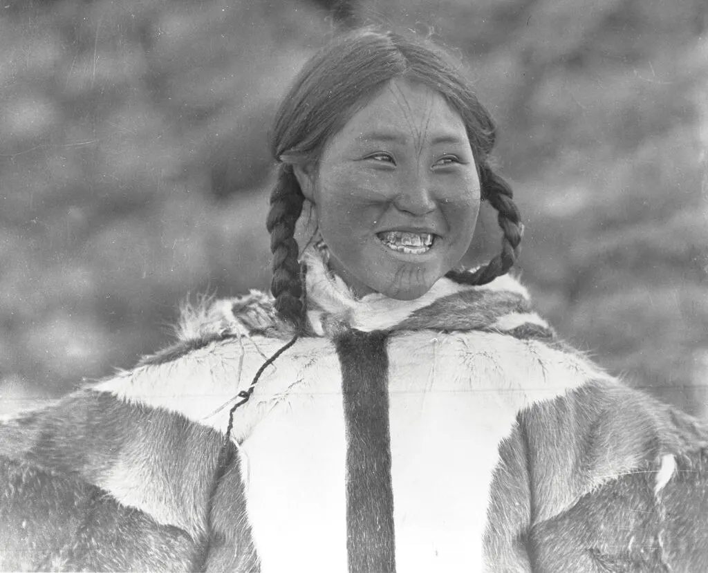 Kila, a young Dolphin and Union Strait woman, was photographed at Bernard Harbour in July 1916.