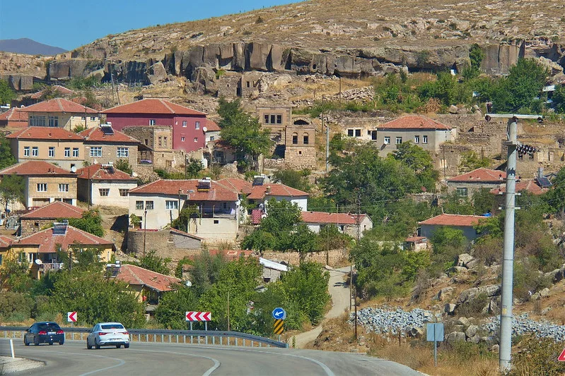 The modern town of Derinkuyu in Turkey sits above the vast underground city once used as a refuge from invaders, hidden entirely from view at the surface.
