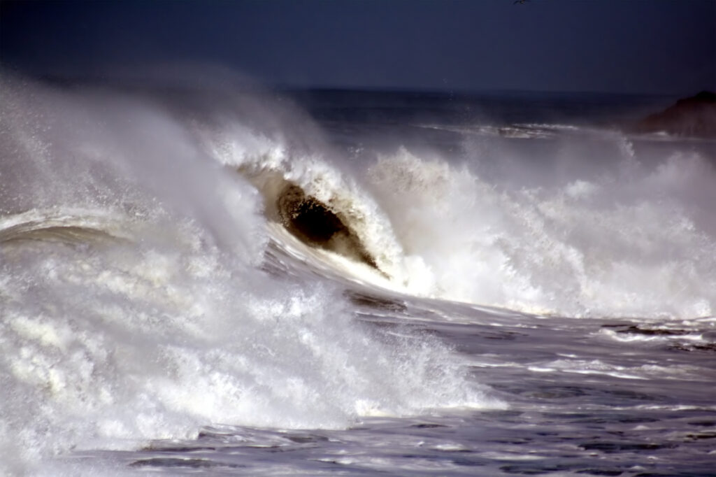 Storm waves off Pacifica, California, used to illustrate conditions similar to the 1982 Trashman disaster that Deborah Scaling Kiley survived.