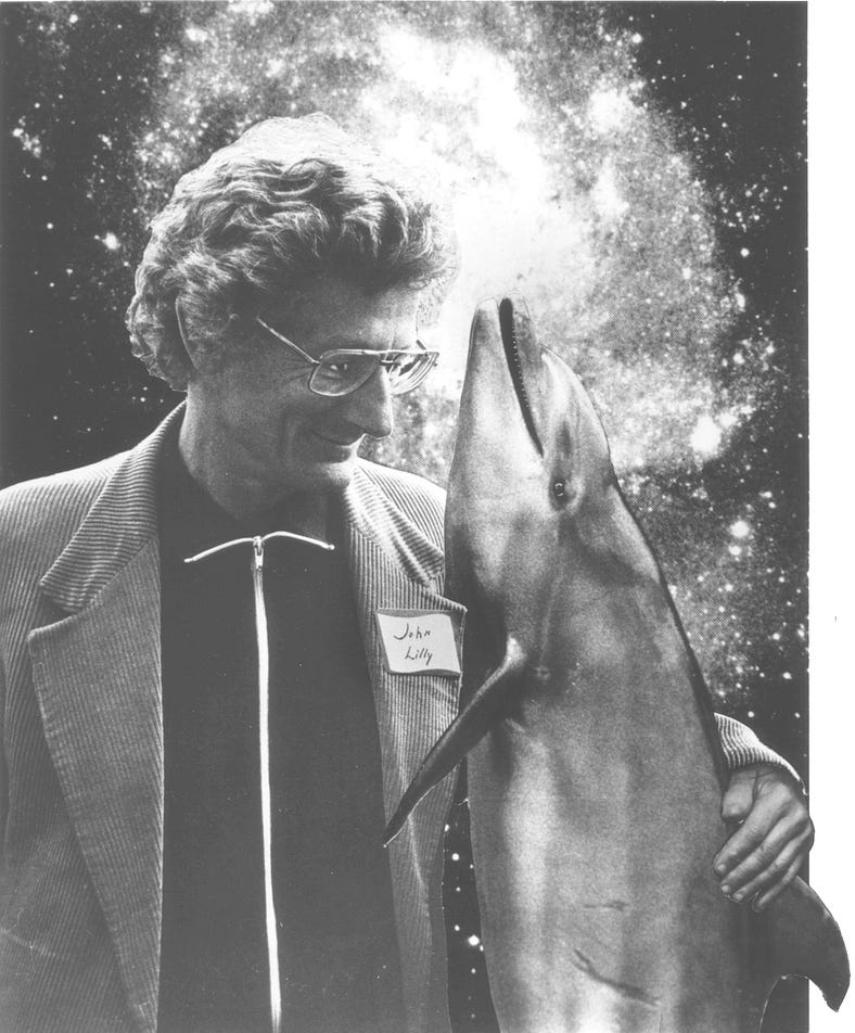 Dr John C Lilly with Peter the dolphin during dolphin communication research. 