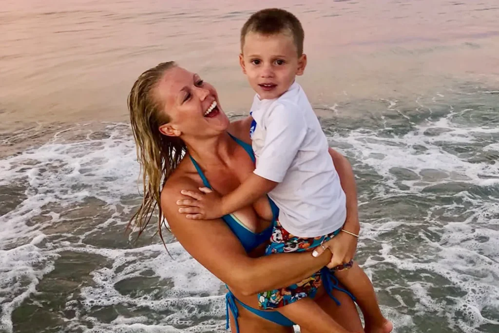 Karoline Leavitt pictured with her nephew in 2018, years before the ICE detention case involving his mother Bruna Ferreira drew national attention