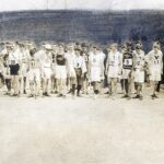 Runners lined up at the start of the 1904 St. Louis Olympic marathon receiving instructions