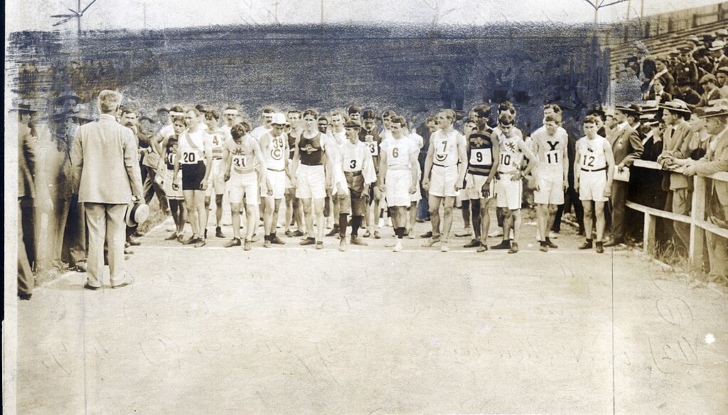 Runners lined up at the start of the 1904 St. Louis Olympic marathon receiving instructions