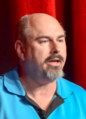 Howard Scott Warshaw speaking at GDC 2015 during a Classic Game Postmortem talk