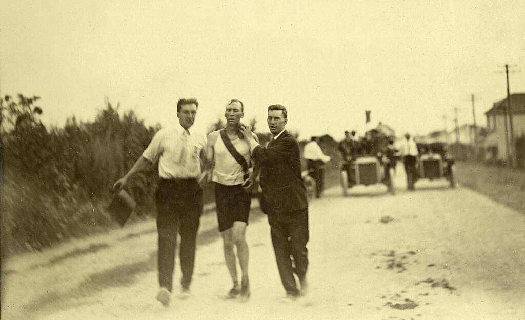 Thomas Hicks with supporters after winning the 1904 St. Louis Olympic marathon