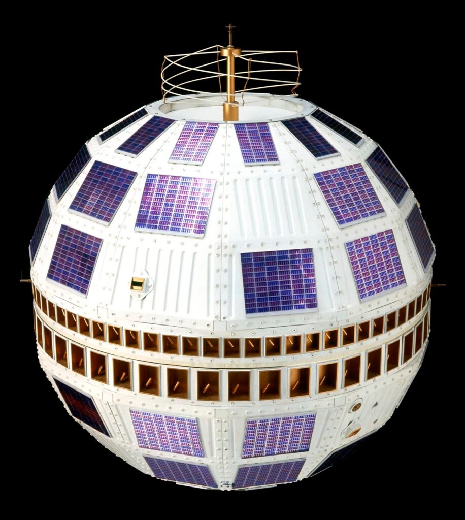 Telstar 1 replica in a museum display, illustrating the Cold War communications satellite era connected to Project West Ford