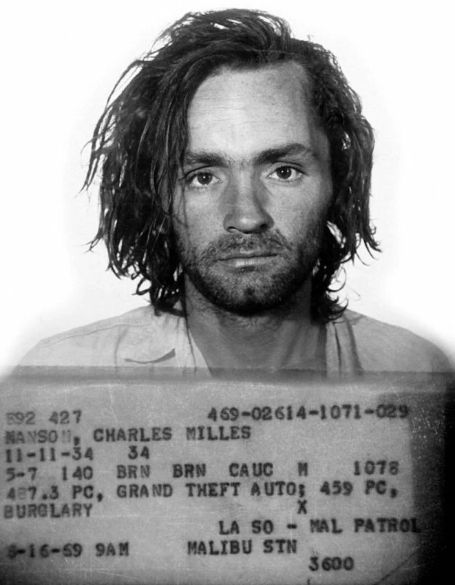 Charles Manson in a booking photograph taken on 16 August 1969, after the Tate–LaBianca murders.