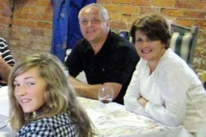 Christopher Foster, his wife Jill and their daughter Kirstie at a party