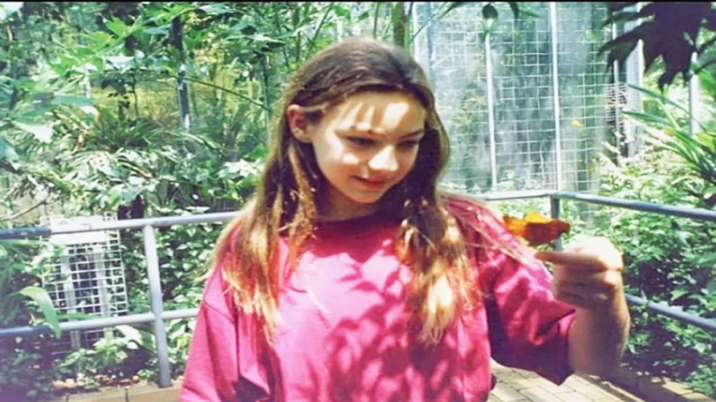 Rachel Barber handling a butterfly