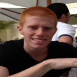 Bryce Laspisa sitting at a table