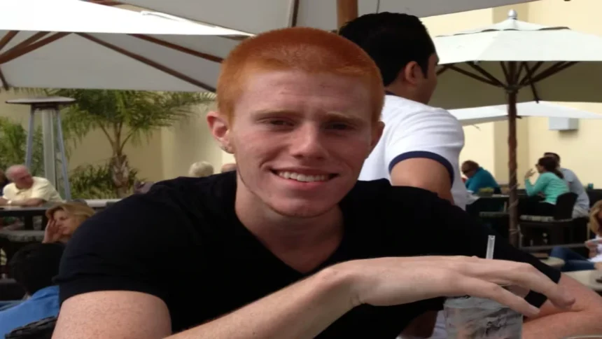 Bryce Laspisa sitting at a table