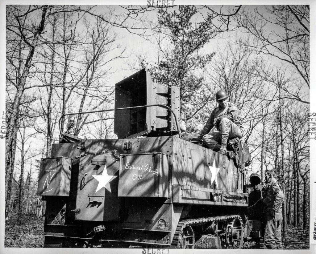 Members of the 'Ghost Army' operating the audio equipment required for the deception, featuring massive speakers. Photo courtesy of the Ghost Army Legacy Project. Members of the 'Ghost Army' operating the audio equipment required for the deception, featuring massive speakers. Photo courtesy of the Ghost Army Legacy Project.