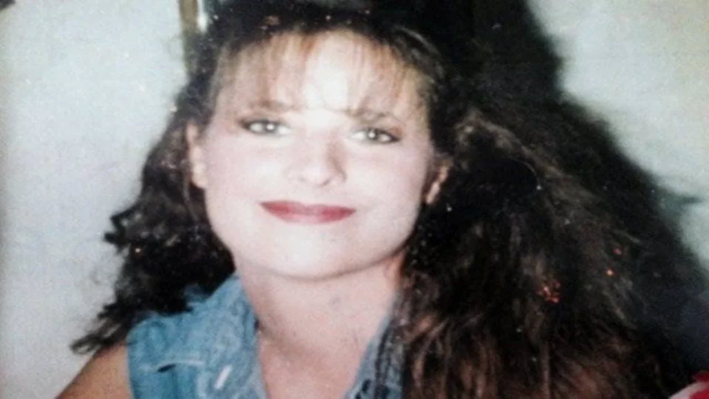 Archival portrait of 23-year-old Heather Teague smiling at the camera.