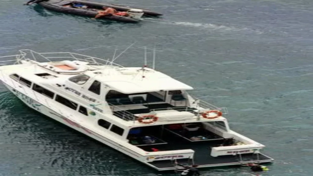 Aerial view of the MV Outer Edge catamaran anchored on the Great Barrier Reef during the investigation into Tom and Eileen Lonergan’s disappearance.