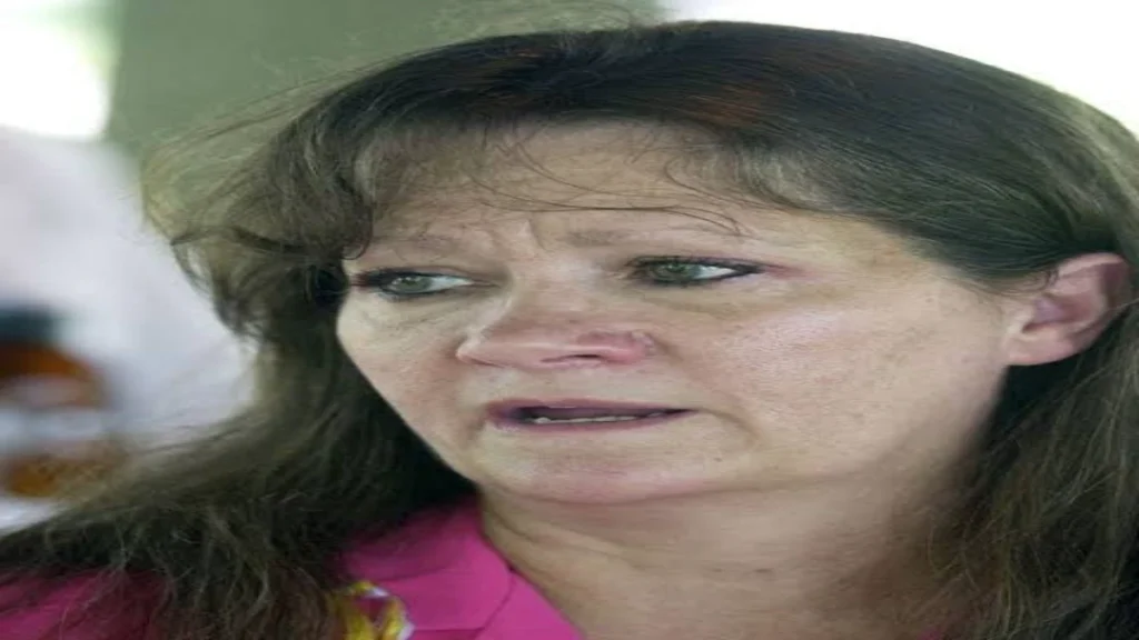 Close-up photograph of an emotional Sarah Teague, the mother of missing Kentucky woman Heather Teague.