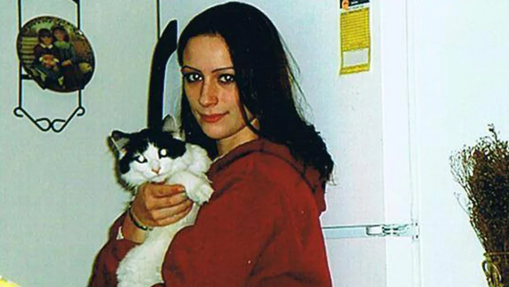 Brianna Maitland sitting with her cat before she disappeared in Vermont in 2004.