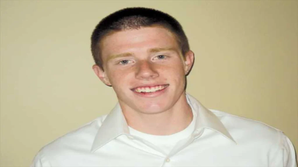 Portrait of 19-year-old Bryce Laspisa smiling while wearing a white button-down shirt.