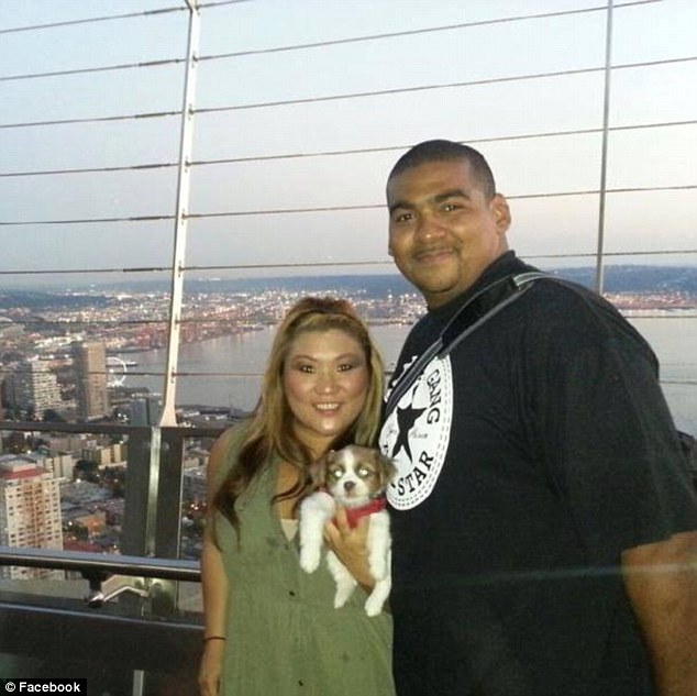 Rico Harris standing with Jennifer Song at the Space Needle in Seattle.
