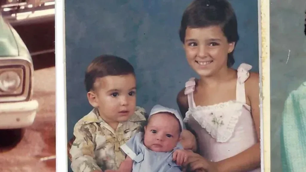 Annette Sagers pictured with her two younger half-brothers before her disappearance.
