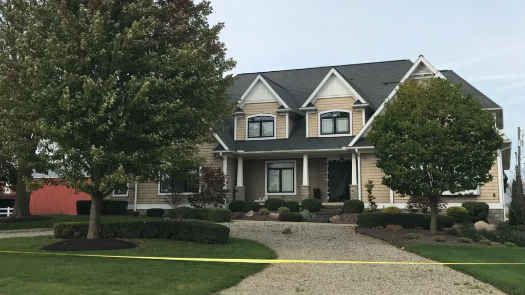 Dale and Dee Anne Warner’s farmhouse on Munger Road in Michigan, cordoned off with police tape during the investigation.