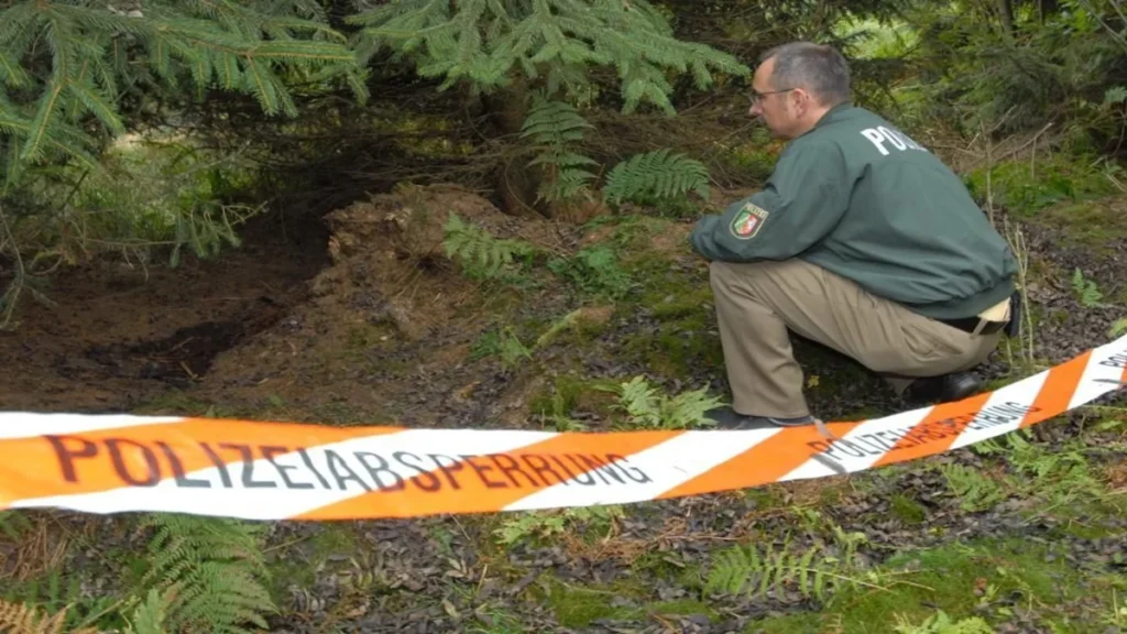 German police investigator at the forest scene where Frauke Liebs’ remains were found.