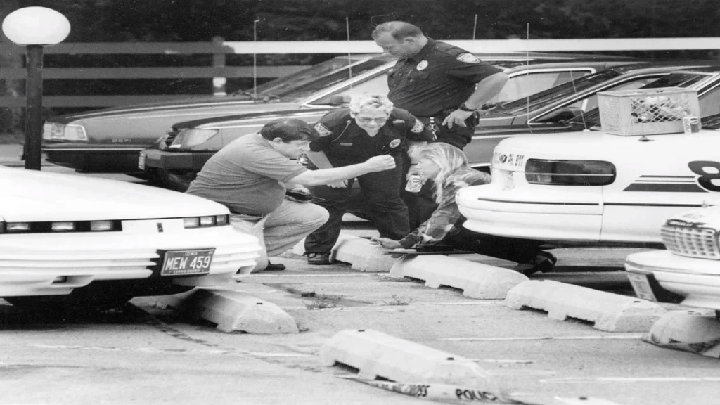 Police investigating the Key Apartments parking lot after Jodi Huisentruit disappeared in 1995.