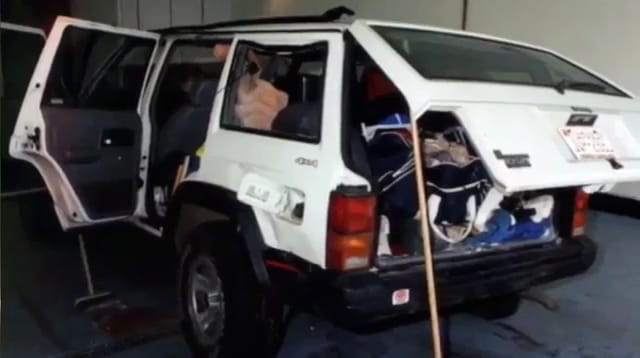Damaged 1993 Jeep Cherokee belonging to missing woman Leah Roberts.