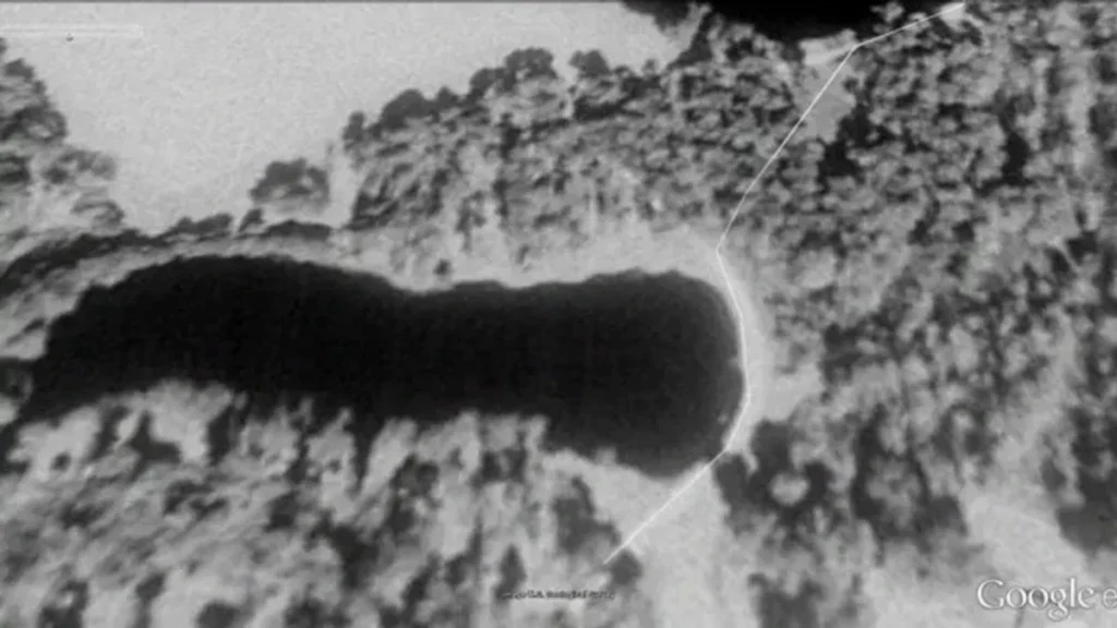 Aerial photograph of a pond at Mount Holly Plantation where a rolled carpet was found.