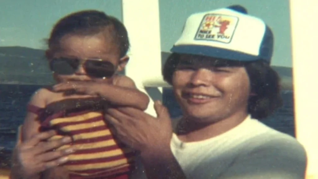 Ronald jack holding his son, Ryan