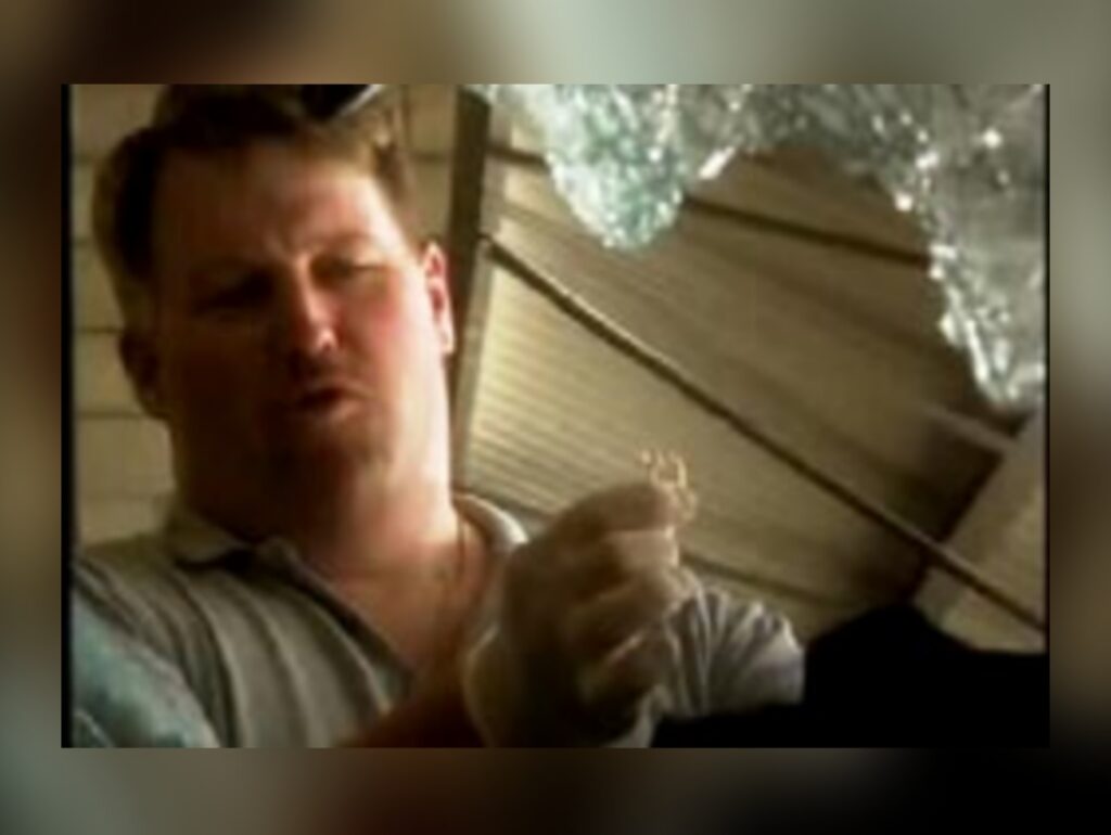 Sgt. Kevin McFadden holding Leah Roberts’s mother’s engagement ring found inside her Jeep.