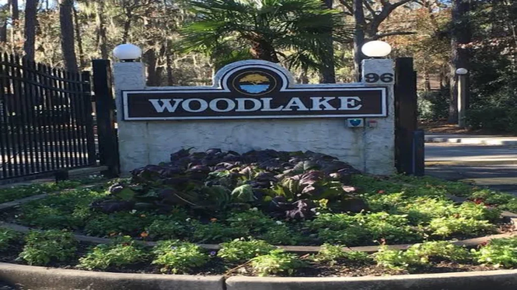 Entrance sign and security gate at the Woodlake Villas residential complex on Hilton Head Island.