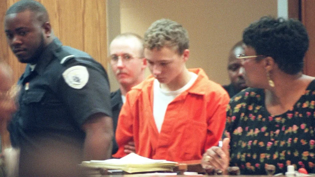 Joshua Phillips entering a Duval County courtroom for his first court appearance in November 1998.