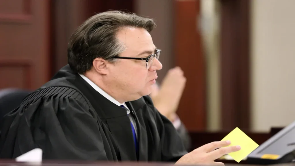 Judge Mike Fleenor delivers instructions to the jury during former Virginia Tech football player Isimemem David Etute’s trial in Montgomery County Circuit Court in Christiansburg.
