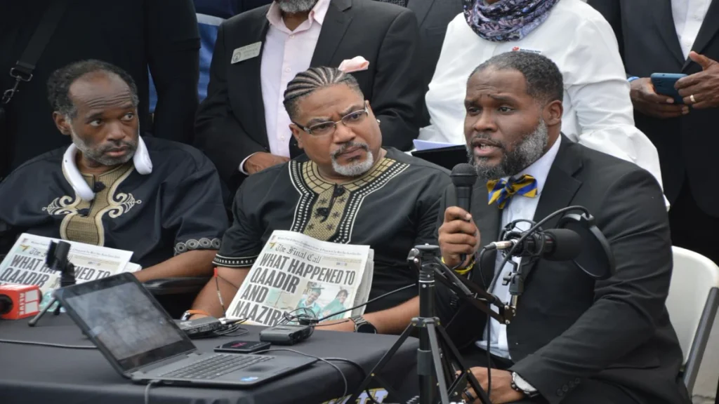 Family members and advocates at a press conference about the deaths of Qaadir and Naazir Lewis.