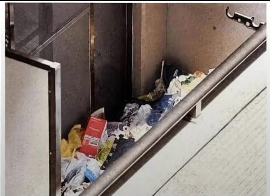 An outer view of the Apartment's balcony, which had been filled with trash to the brink.