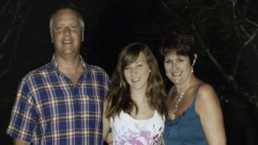 Foster family: Christopher Foster (left), his 15-year-old daughter Kirstie (center), and his wife Jill (right).
