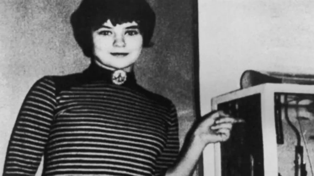 A young Mary Bell wearing a striped top.