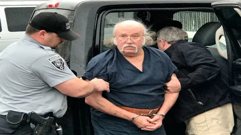 Ronald Busick in handcuffs.