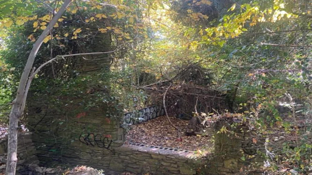 The crumbling, graffiti-strewn stone ruins of the "Witches Castle" in Utica, Indiana, stand as a grim monument to the opening hours of the tragedy.