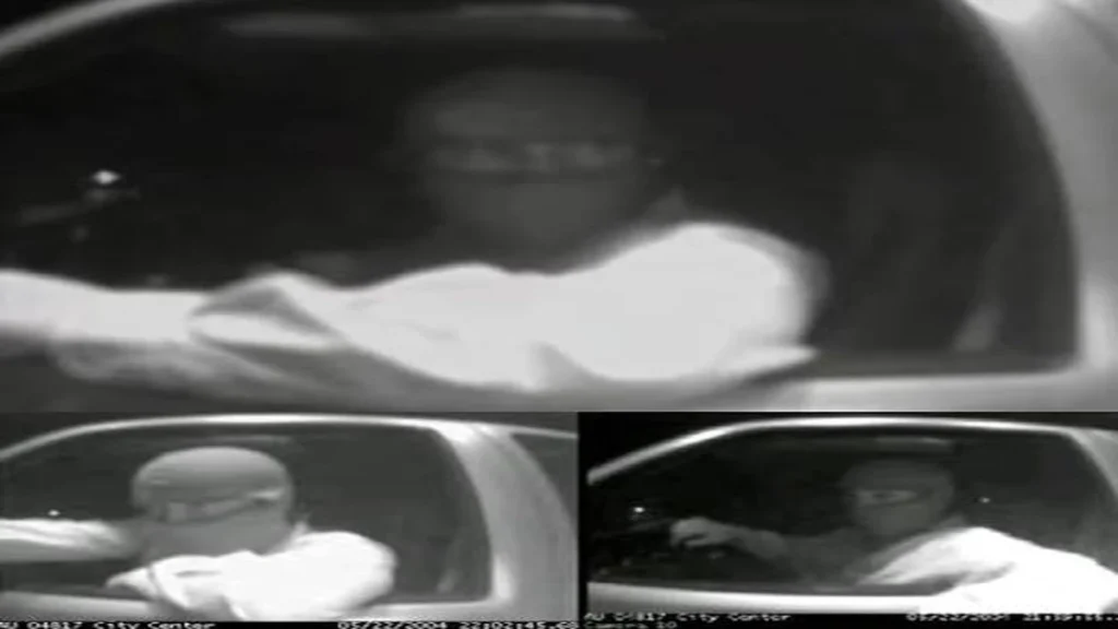 The suspect captured on CCTV in the driveway of an ATM. 