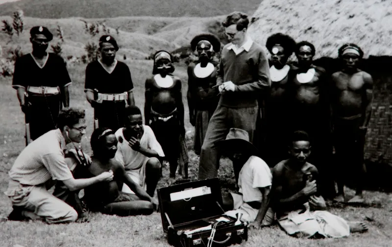 Doctors Donald Simpson and David Lander visiting Okapa, Papua New Guinea, in 1957 during investigations into the deadly kuru epidemic.